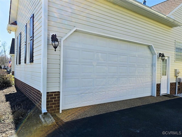 garage with driveway