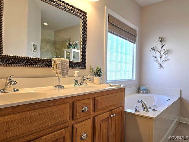 full bath featuring a bath, tile patterned flooring, a stall shower, and a sink