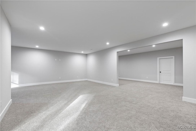 below grade area featuring carpet, recessed lighting, and baseboards