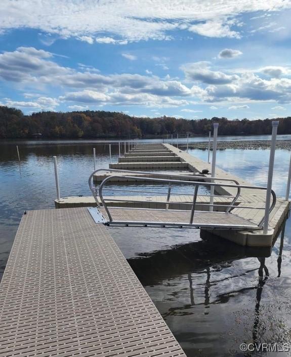 view of dock with a water view