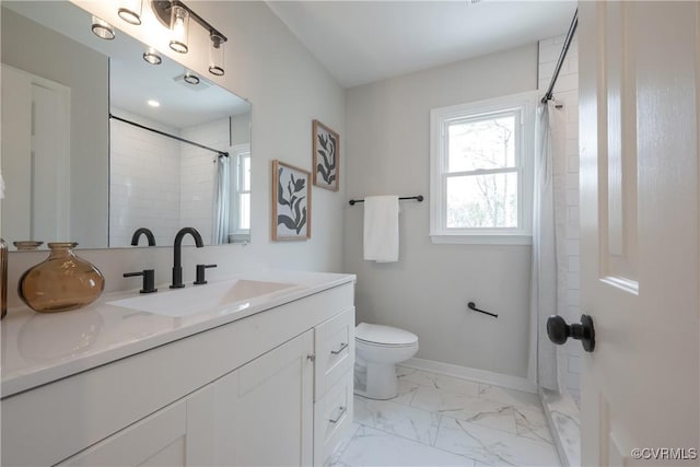 bathroom with curtained shower, baseboards, toilet, marble finish floor, and vanity