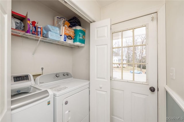 washroom with laundry area and washing machine and dryer