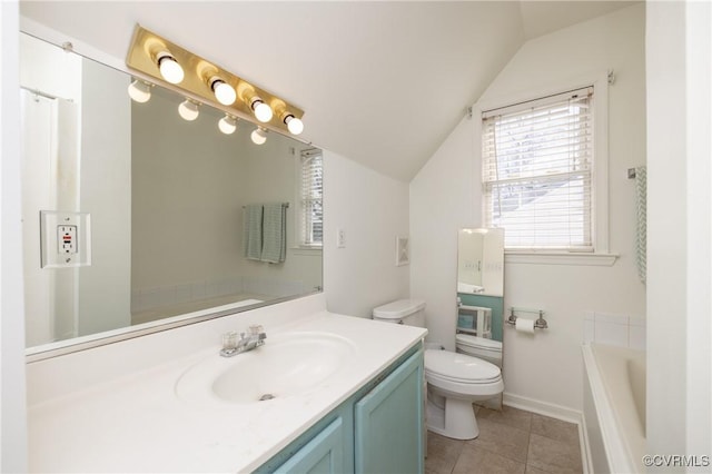 bathroom with lofted ceiling, toilet, vanity, and a washtub