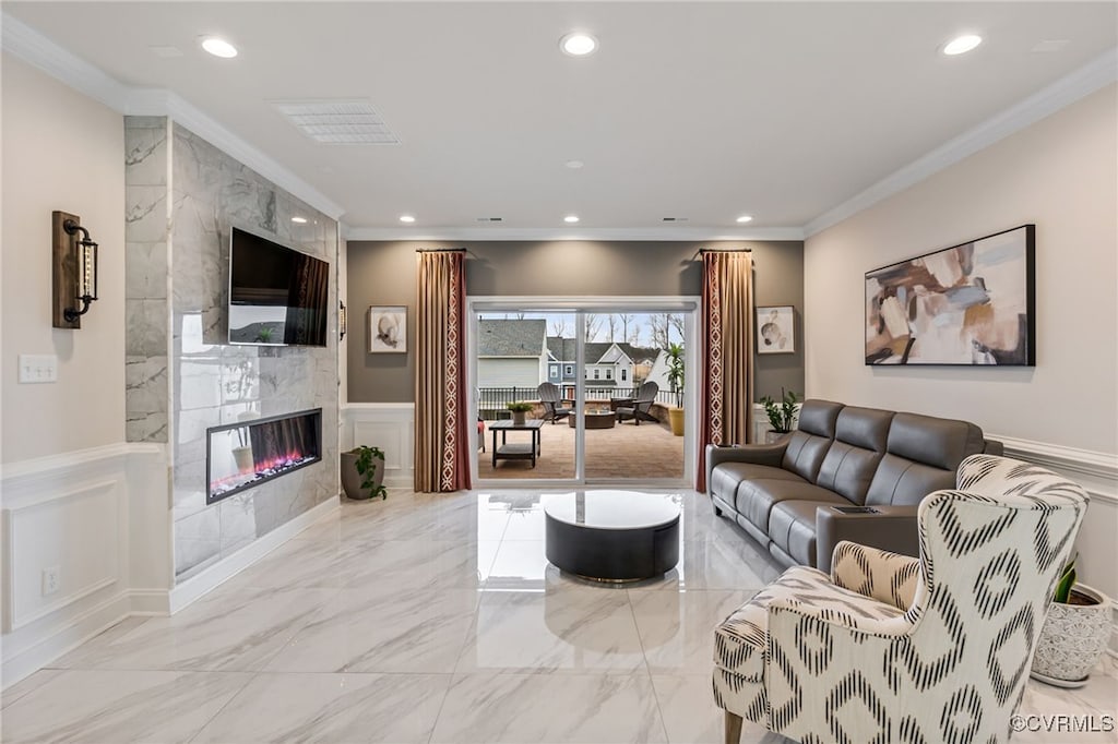 7044 Dunton Rd, Chesterfield, VA 23832 - living room with recessed lighting, ornamental molding, a fireplace, marble tiled flooring, and wainscoting
