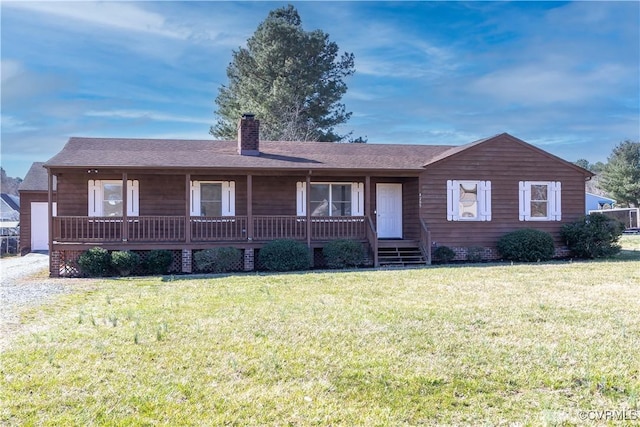 ranch-style home with a shingled roof, a porch, a front lawn, and a chimney