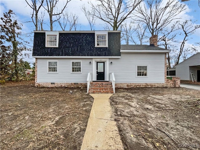 colonial inspired home with roof with shingles and crawl space