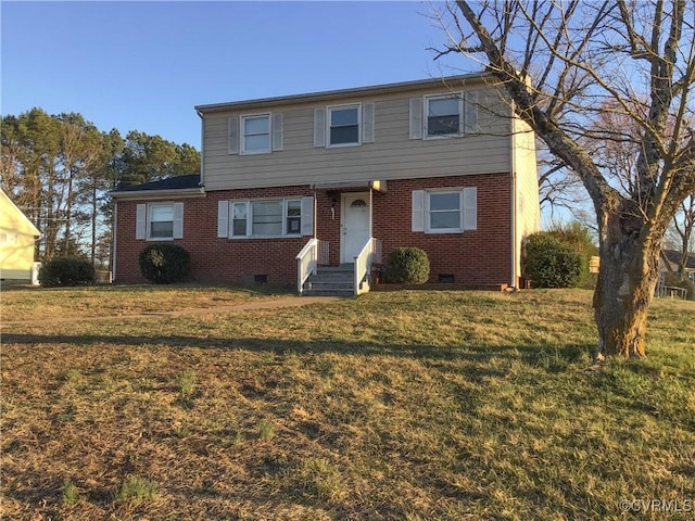 view of front facade with crawl space, a front lawn, and brick siding