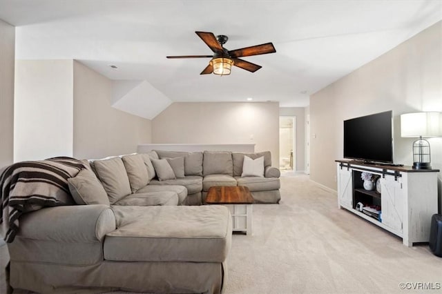 living room featuring light colored carpet and ceiling fan