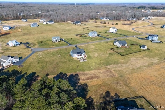 aerial view with a view of trees and a rural view