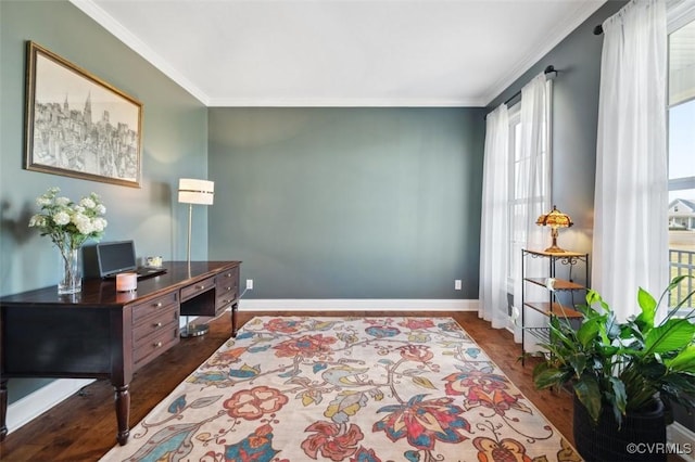 office area with wood finished floors, baseboards, and ornamental molding