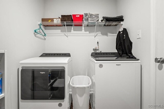 laundry room featuring laundry area and washer and clothes dryer