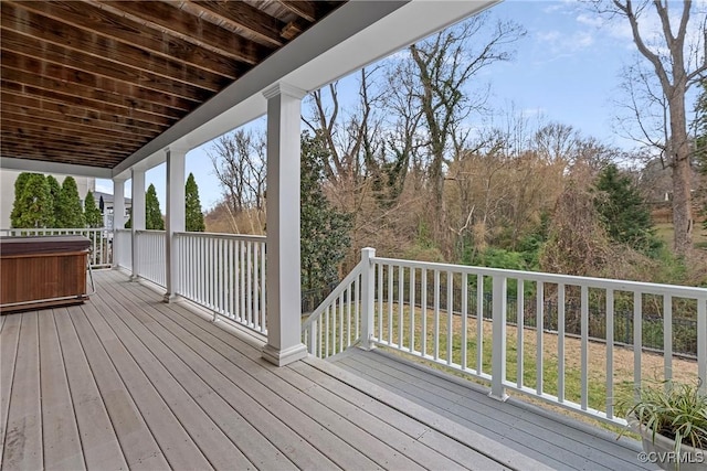 deck featuring a lawn