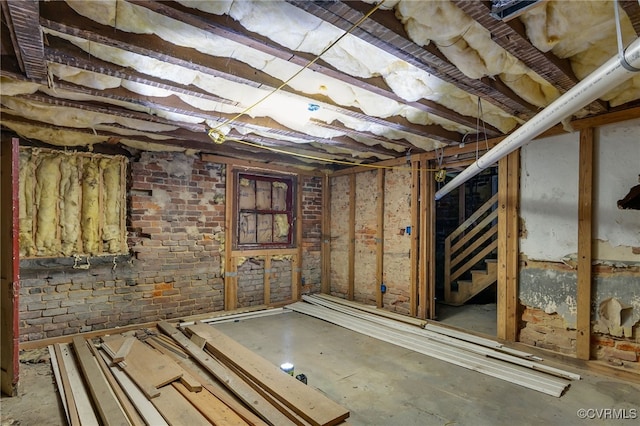 unfinished basement with brick wall