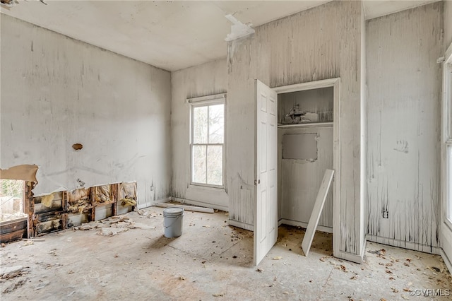 unfurnished bedroom with a closet