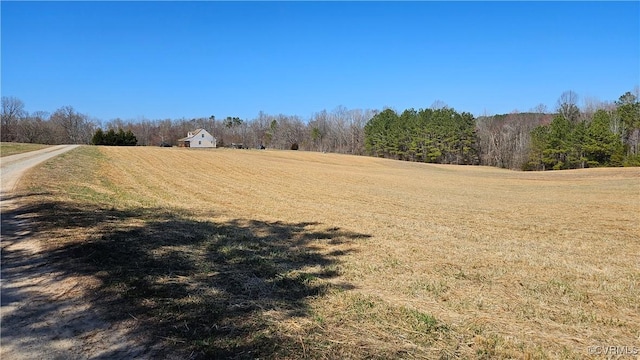 exterior space with a rural view