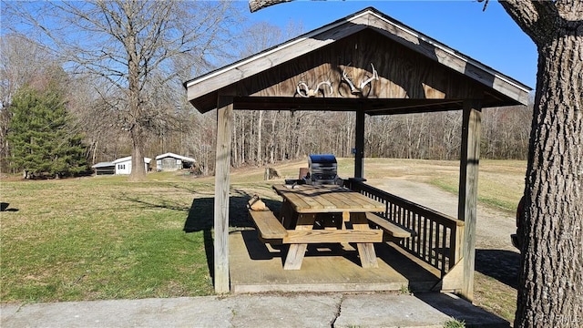 view of home's community with a gazebo and a lawn