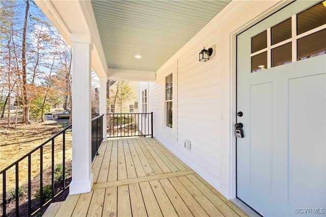 wooden deck featuring a porch