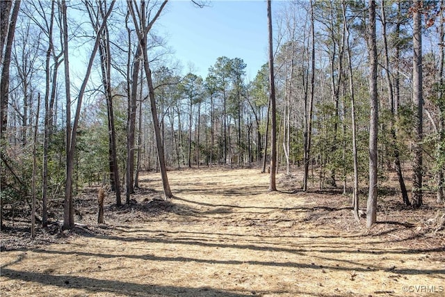 view of landscape with a view of trees