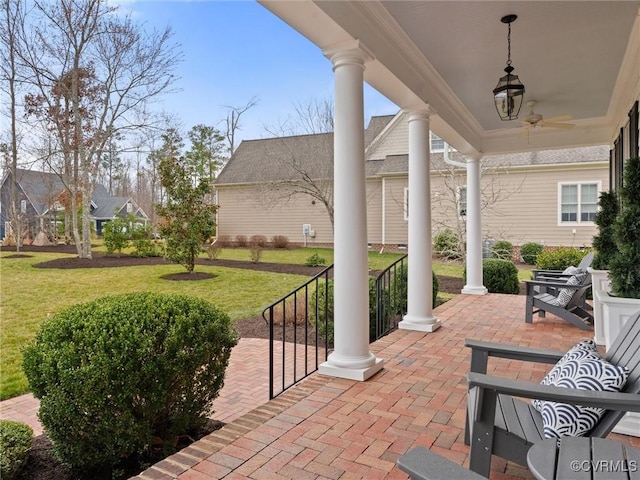 view of patio / terrace featuring ceiling fan