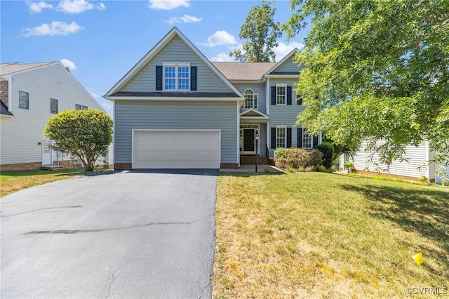 view of front of house featuring a front yard and driveway