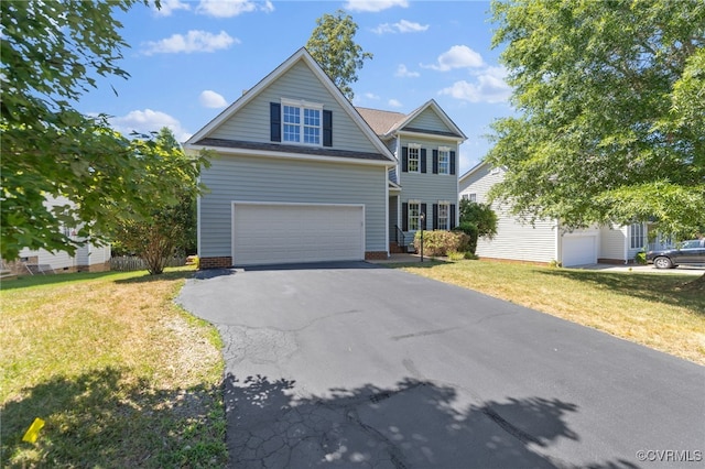 view of front of property with aphalt driveway, a garage, and a front lawn