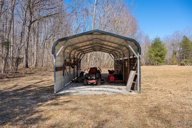 surrounding community with a carport and driveway