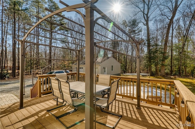 wooden deck with outdoor dining area