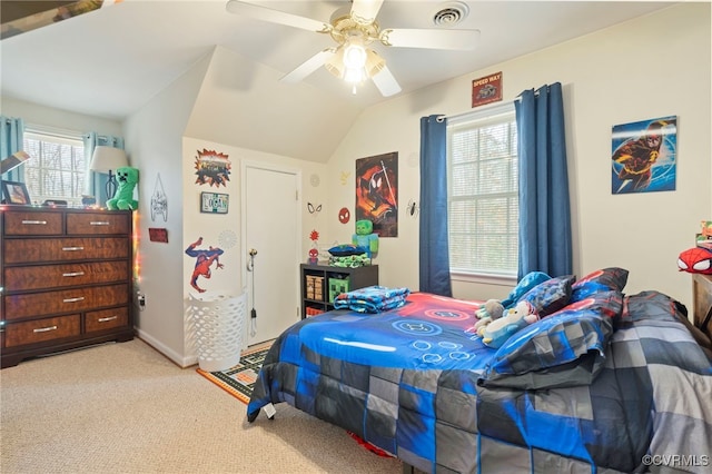 bedroom with visible vents, a ceiling fan, baseboards, carpet, and lofted ceiling