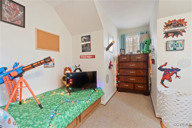 bedroom with baseboards, light colored carpet, and lofted ceiling