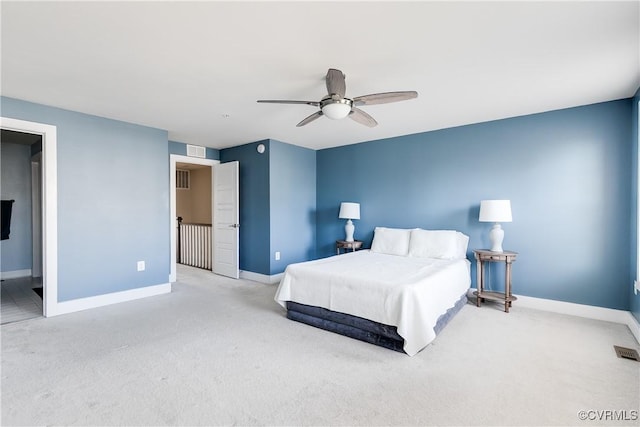 bedroom with a ceiling fan, visible vents, baseboards, and carpet floors