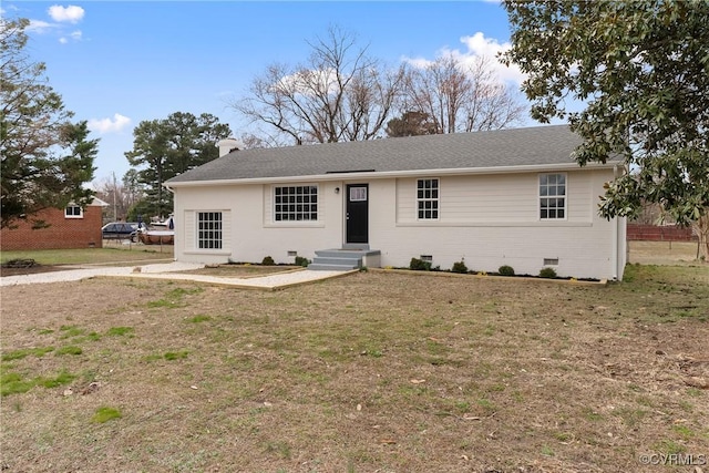 single story home featuring a front yard, roof with shingles, entry steps, crawl space, and brick siding