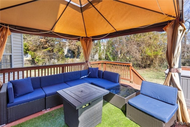 deck with a gazebo and an outdoor living space