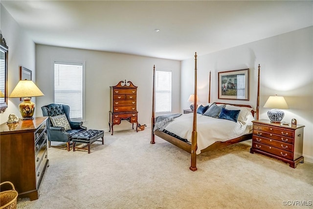 bedroom with light carpet