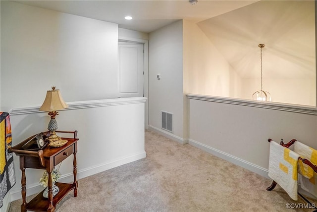 hall featuring recessed lighting, carpet flooring, baseboards, and visible vents