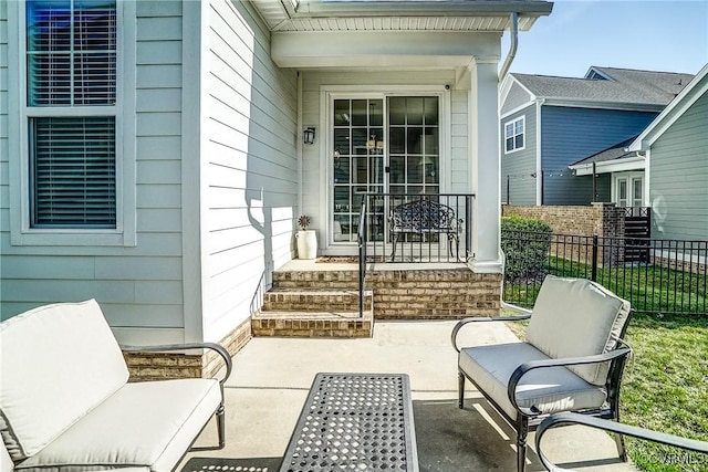 view of patio / terrace with outdoor lounge area and fence