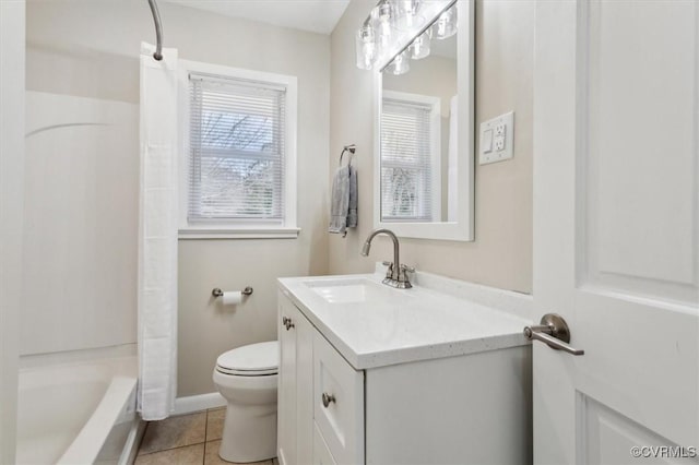 full bath with tile patterned flooring, toilet, vanity, and shower / bath combo