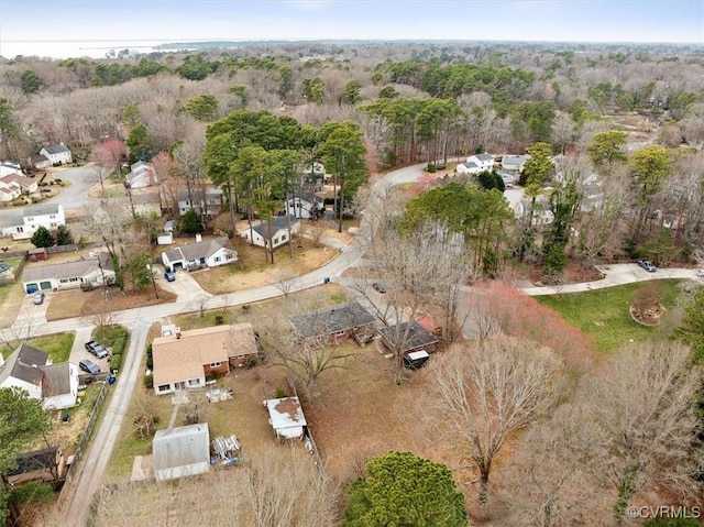 aerial view featuring a view of trees