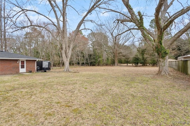 view of yard featuring fence