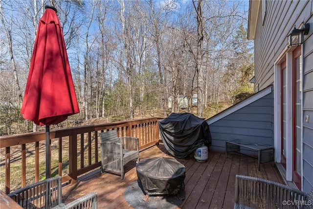 deck featuring a fire pit