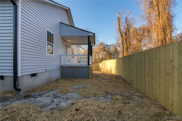 view of yard with a fenced backyard