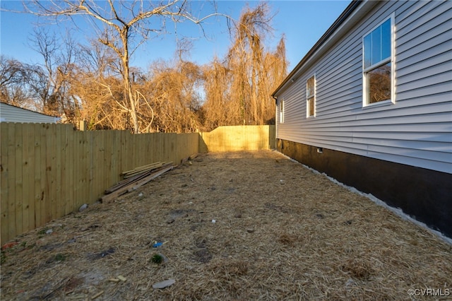 view of yard featuring a fenced backyard