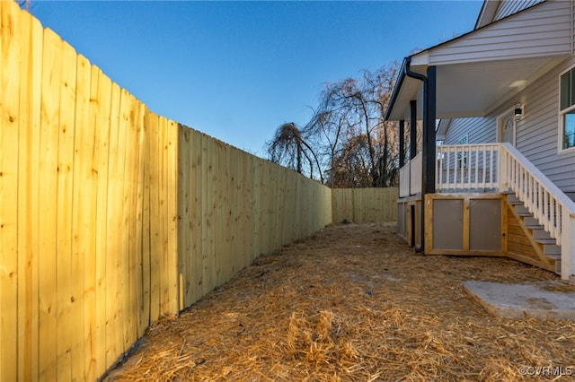 view of yard with a fenced backyard