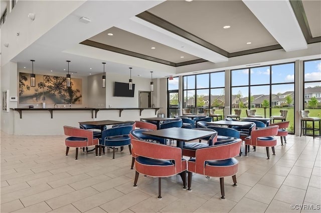 dining room with beamed ceiling and recessed lighting