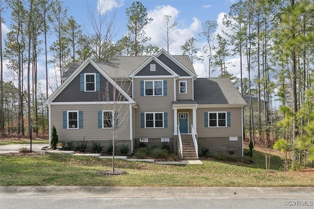 view of front of home featuring crawl space and a front yard