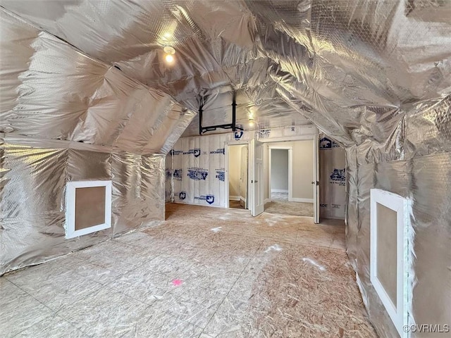 bonus room featuring lofted ceiling