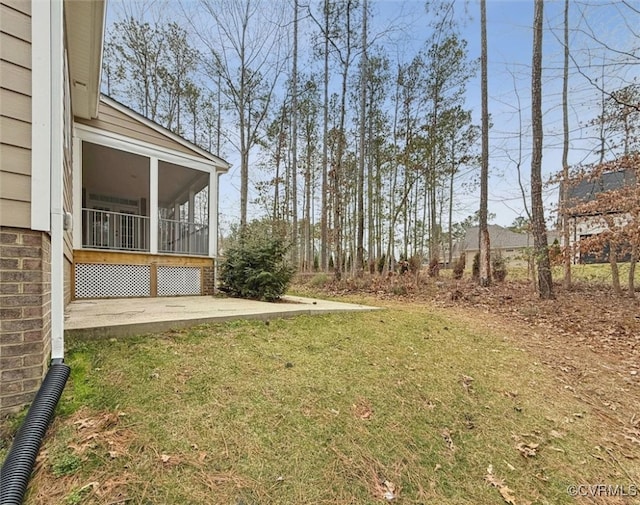 view of yard with a sunroom