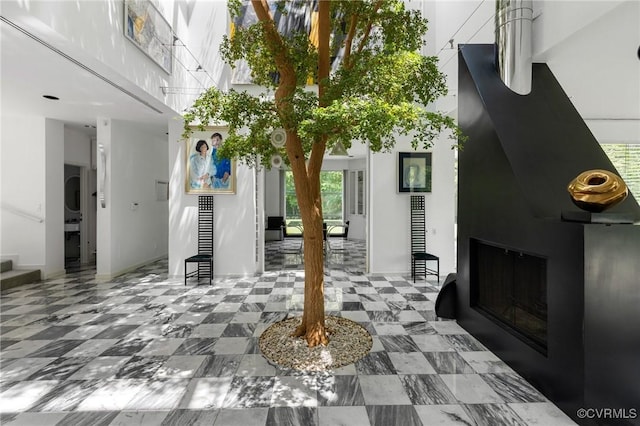 view of patio with a fireplace