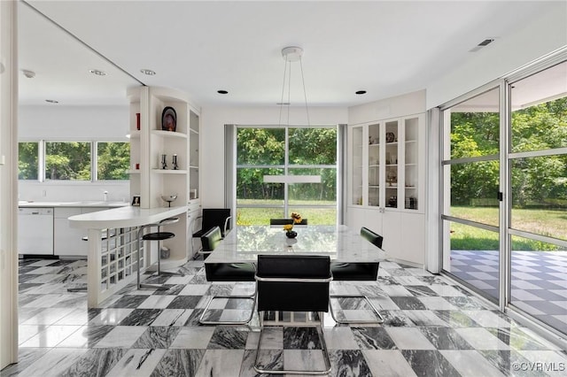 dining area featuring visible vents