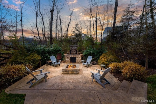 view of patio with a fire pit