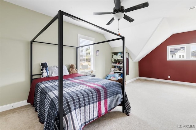 carpeted bedroom featuring visible vents, a baseboard heating unit, baseboards, lofted ceiling, and a ceiling fan